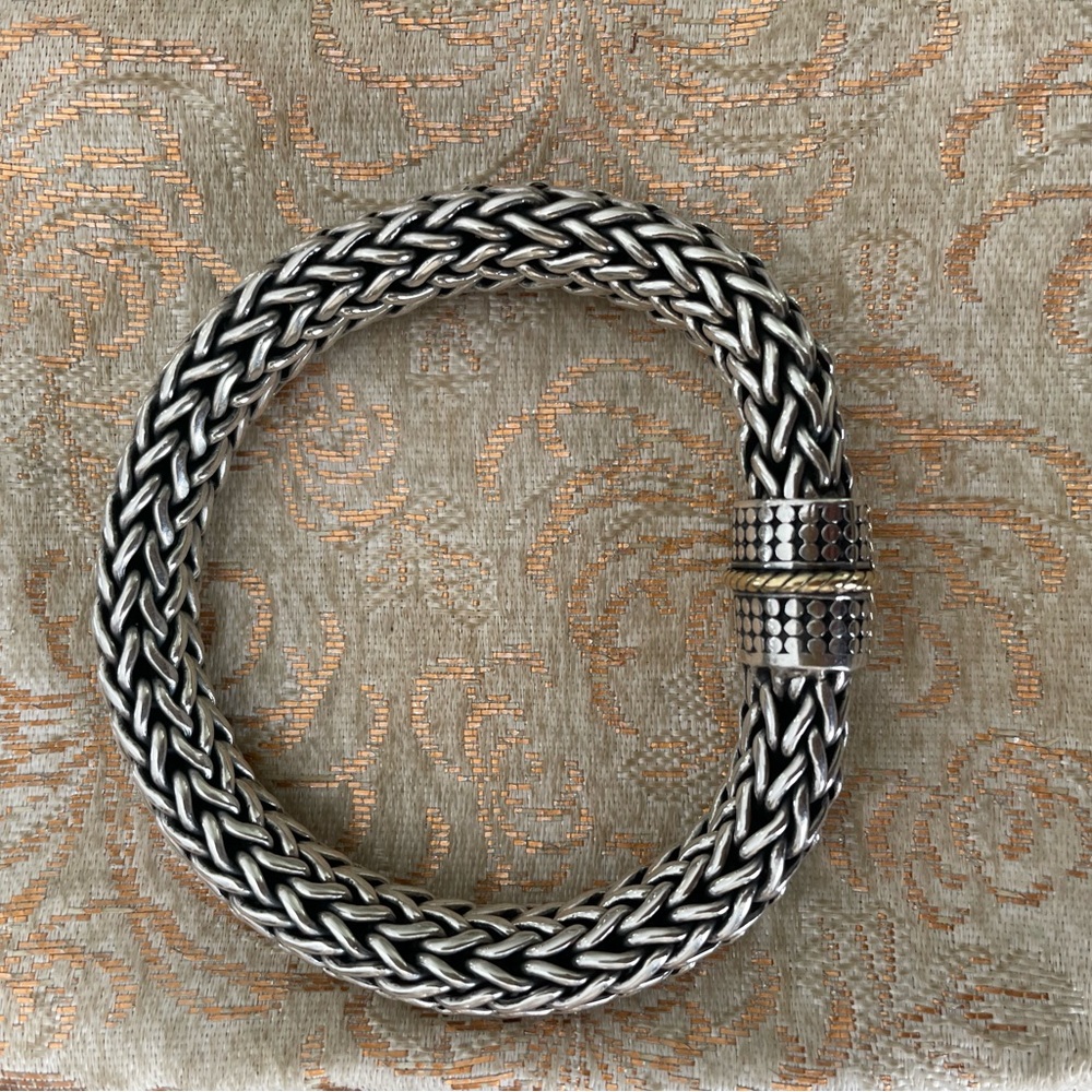 Bali Style Sterling Silver Bracelet with gold detail on clasp.